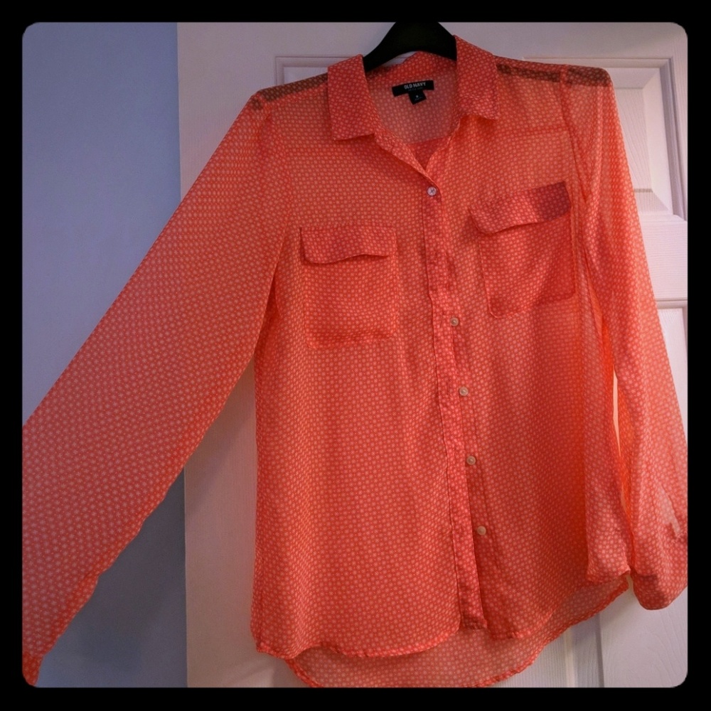 Sheer peach blouse.